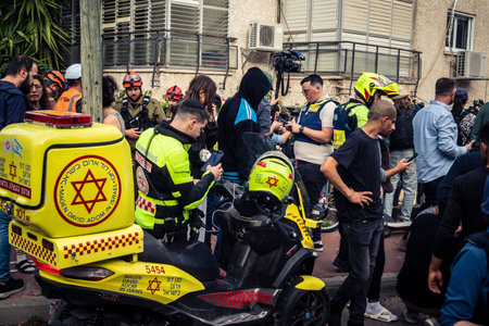 Tel Aviv, Ramat Gan, Israel, March 18, 2026 Emergency services including firefighters, paramedics,...