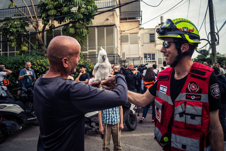 Tel Aviv, Ramat Gan, Israel, March 18, 2026 Emergency services including firefighters, paramedics,...