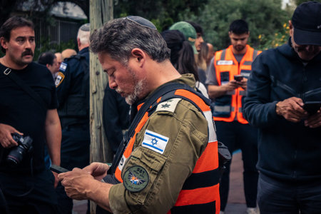 Tel Aviv, Ramat Gan, Israel, March 18, 2026 Emergency services including firefighters, paramedics,...