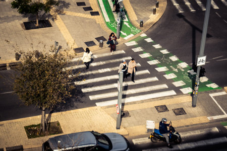 Tel Aviv, Israel, January 21, 2026 Passersby stroll through the Florentine district, renowned for...