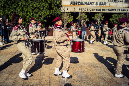 Bethlehem, West Bank, December 24, 2025 Palestinian scout marching band performs during the...