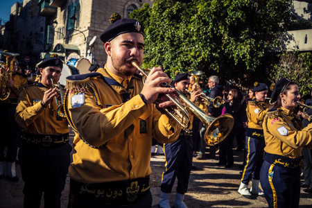 Bethlehem, West Bank, December 24, 2025 Close-up details of a Palestinian scout marching band during the Christmas parade. Intensity of the musicians defines this traditional holiday celebration.のeditorial素材