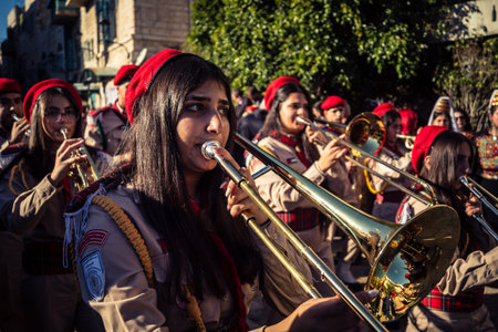 Bethlehem, West Bank, December 24, 2025 Close-up details of a Palestinian scout marching band during the Christmas parade. Intensity of the musicians defines this traditional holiday celebration.のeditorial素材