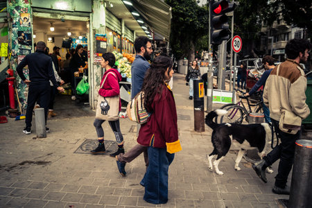 Tel Aviv, Israel, March 13, 2026 People shopping at Levinsky Market, daily life scene with customers and vendors in traditional Mediterranean market.のeditorial素材