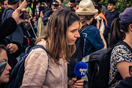 Tel Aviv, Ramat Gan, Israel, March 18, 2026 BFMTV journalists present at the scene at the exact moment of the Iranian missile attack in the Ramat Gan district of Tel Aviv. The French media crew was very close to the impact site, witnessing the explosion aのeditorial素材
