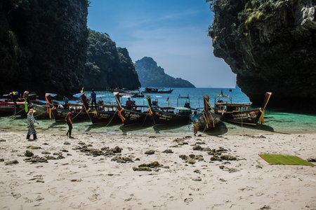 Krabi, Thailand, January 07, 2025 A long-tail boat is a traditional Thai wood boat that is a common sight in southern Thailand. used for a variety of purposes, including transporting tourists.のeditorial素材