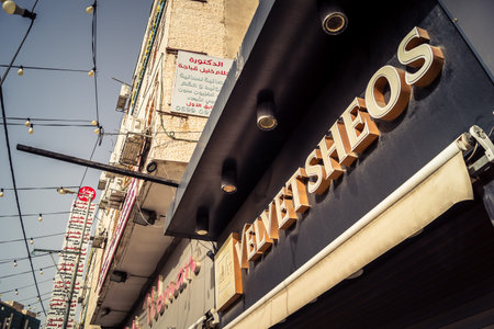 Hebron, West Bank, January 30, 2026 Arabic language posters, political signs and torn advertisements on urban walls in the city center of Hebron.のeditorial素材