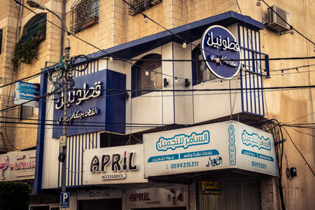 Hebron, West Bank, January 30, 2026 Arabic language posters, political signs and torn advertisements...