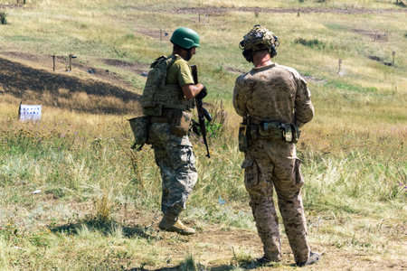 Donbass, Ukraine, August 16, 2025 Ukrainian soldiers train in various combat techniques. They practice shooting drills and trench warfare. Soldier training plays a vital role in the war against Russiaのeditorial素材