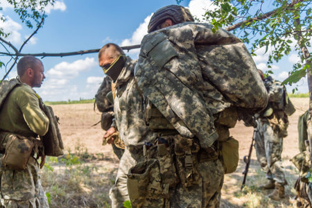 Donbass, Ukraine, August 16, 2025 Ukrainian soldiers train in various combat techniques. They practice shooting drills and trench warfare. Soldier training plays a vital role in the war against Russiaのeditorial素材