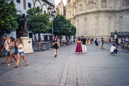 Seville, Spain, September 21, 2025 Tourists visit the historic district of downtown Seville and walk through the narrow, picturesque streets.のeditorial素材
