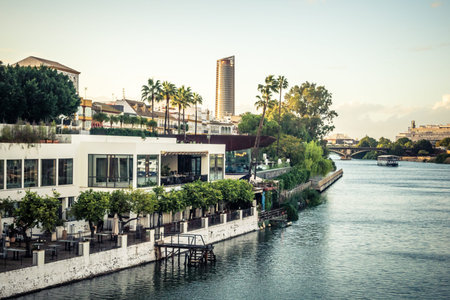 Seville, Spain, November 5, 2025 Historic district, street scenes and daily life. Traffic and architecture, a picturesque view of the urban life in andalousia.のeditorial素材