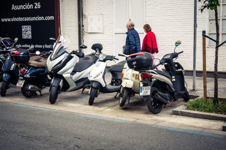Seville, Spain, December 9, 2025 Seville street scenes and daily life. Traffic and architecture, a...