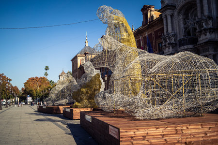 Seville, Spain, December 11, 2025 Seville street scenes and daily life. Traffic and architecture, a picturesque view of the urban life in andalousia.のeditorial素材