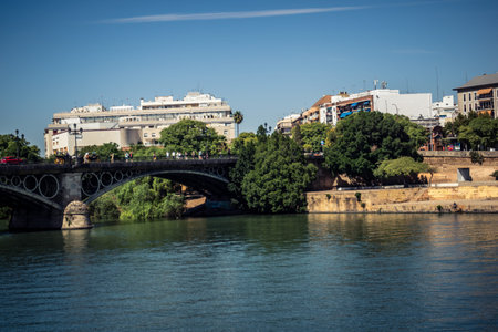 Seville, Spain, September 28, 2025 Views of the Guadalquivir River flowing through the city of Seville.のeditorial素材