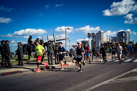 Tel Aviv, Israel, February 27, 2026 Runners competing in the streets during the annual marathon,...
