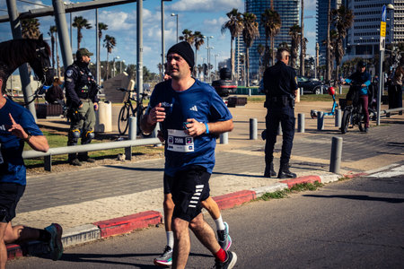 Tel Aviv, Israel, February 27, 2026 Runners competing in the streets during the annual marathon,...
