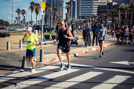 Tel Aviv, Israel, February 27, 2026 Thousands of athletes and marathon runners competing in the streets of the city during the annual international race event along the Mediterranean coast.のeditorial素材