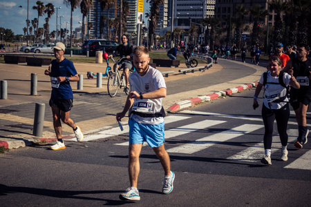 Tel Aviv, Israel, February 27, 2026 Runners competing in the streets during the annual marathon,...