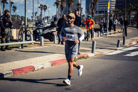 Tel Aviv, Israel, February 27, 2026 Thousands of athletes and marathon runners competing in the streets of the city during the annual international race event along the Mediterranean coast.のeditorial素材