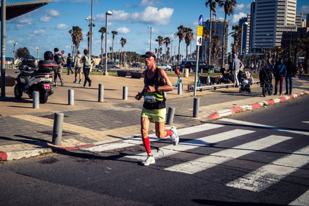 Tel Aviv, Israel, February 27, 2026 Thousands of athletes and marathon runners competing in the streets of the city during the annual international race event along the Mediterranean coast.のeditorial素材