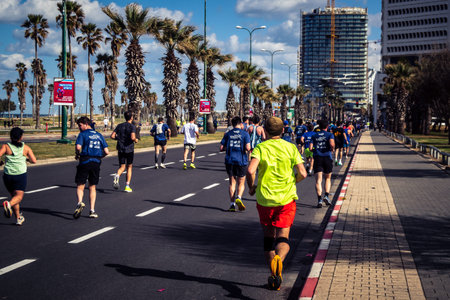 Tel Aviv, Israel, February 27, 2026 Large crowd of runners competing in the streets during the...