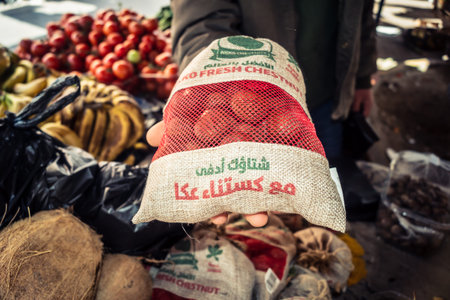 Hebron, West Bank, Palestine - February 12, 2026 Fresh fruits display for sale on a stall at the...