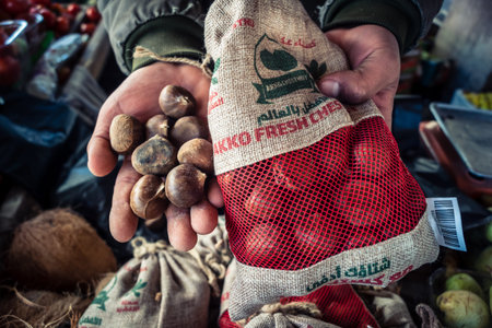 Hebron, West Bank, Palestine - February 12, 2026 Fresh fruits display for sale on a stall at the...