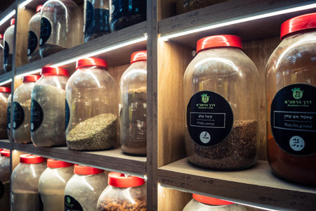 Jerusalem, Israel - February 17, 2026 Exploration of traditional spices at Mahane Yehuda Market, showcasing vibrant colors, exotic textures and culinary heritage in this iconic urban location.のeditorial素材