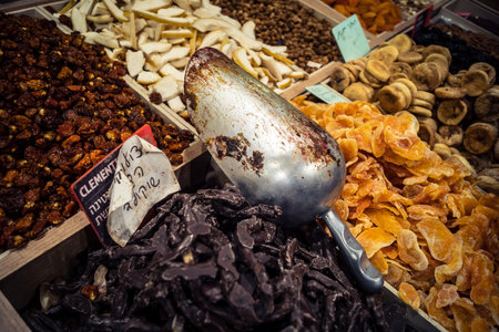 Jerusalem, Israel - February 17, 2026 Exploration of traditional dried fruits, vegetables and...