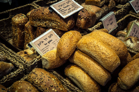 Jerusalem, Israel - February 17, 2026 The art of traditional bread at Mahane Yehuda, showcasing...