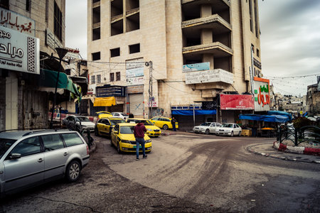 Hebron, West Bank, Palestine, April 01, 2026 Closed storefronts and shuttered businesses line the...
