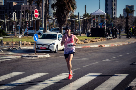 Tel Aviv, Israel, February 27, 2026 Runners competing in the streets during the annual marathon,...