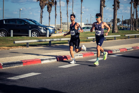 Tel Aviv, Israel, February 27, 2026 Runners competing in the streets during the annual marathon,...