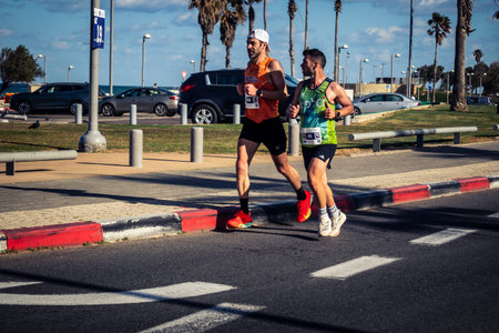 Tel Aviv, Israel, February 27, 2026 Runners competing in the streets during the annual marathon,...