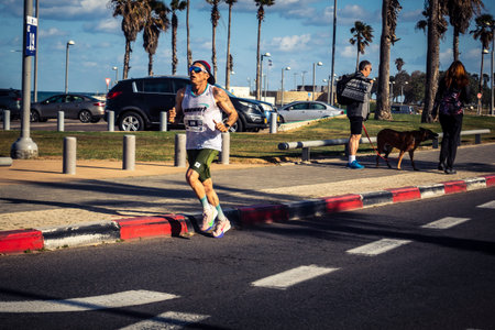 Tel Aviv, Israel, February 27, 2026 Runners competing in the streets during the annual marathon,...