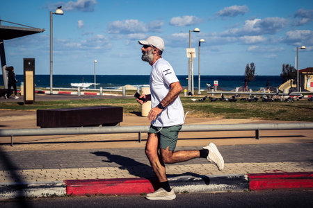 Tel Aviv, Israel, February 27, 2026 Runners competing in the streets during the annual marathon,...