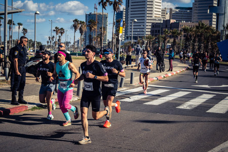 Tel Aviv, Israel, February 27, 2026 Runners competing in the streets during the annual marathon,...
