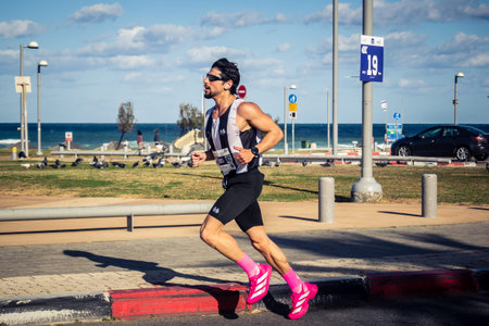 Tel Aviv, Israel, February 27, 2026 Runners competing in the streets during the annual marathon,...