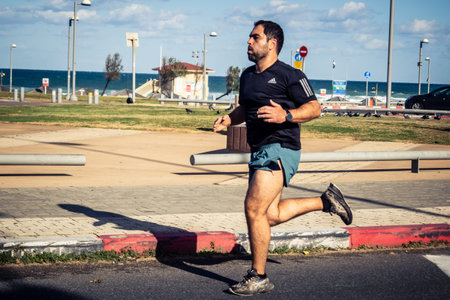 Tel Aviv, Israel, February 27 2026 Large crowd of runners competing in the streets during the annual...