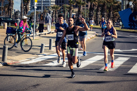 Tel Aviv, Israel, February 27, 2026 Runners competing in the streets during the annual marathon,...