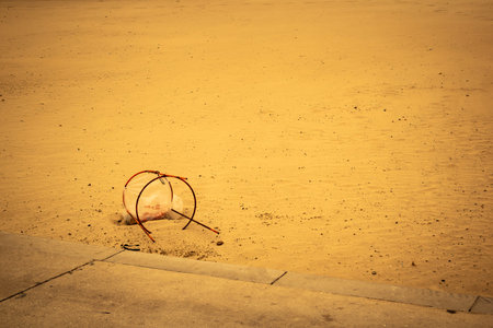 Tel Aviv, Israel, March 14, 2026 Empty playgrounds and beach structures stand abandoned as a thick...