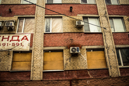 Kherson, Ukraine, November 18, 2022 Cityscape and facade of building in Kherson city. Russian troops...