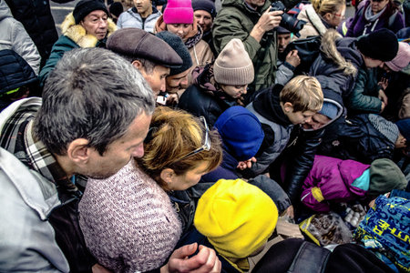 Kherson, Ukraine, November 20, 2022 Residents  receive food supplies in Freedom Square. The tension...