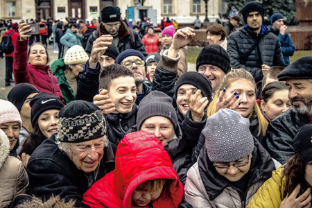 Kherson, Ukraine, November 20, 2022 Residents  receive food supplies in Freedom Square. The tension...