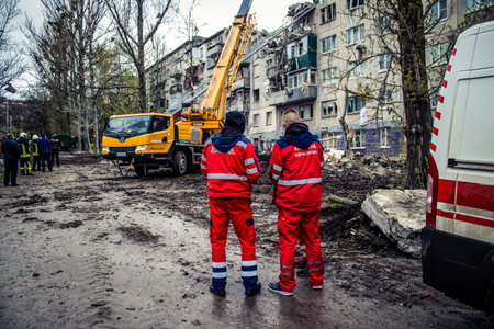 Sloviansk, Ukraine, April 14, 2023 Rescuers intervene on a building in a residential area of...