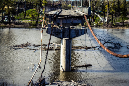 Sviatohirsk, Ukraine - 17 Apr 2023 Destroyed bridge by intense artillery fire in the city of...