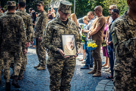 Lviv, Ukraine, August 31, 2024 Military funeral ceremony at the Church of the Most Holy Apostles...