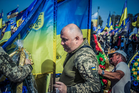 Kharkiv, Ukraine, September 30, 2024 Funeral and burial of Captain Maksym Kudrin, the company...