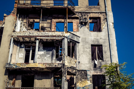 Kharkiv, Ukraine, June 9, 2025 A building damaged by a Russian ballistic missile attack. Civilians...